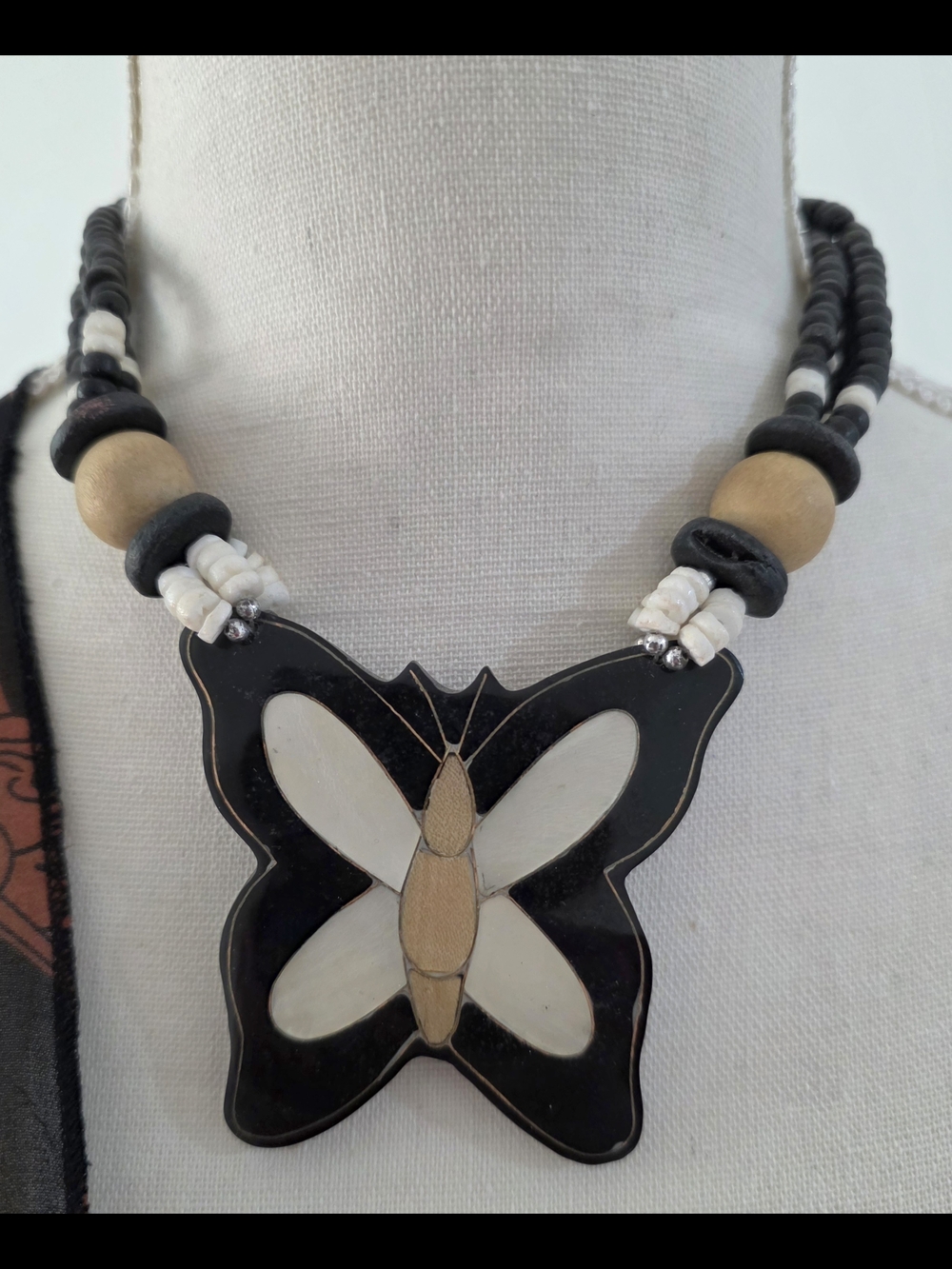 Handcrafted In Jamaica.Beautiful  Black and Cream Butterfly Pendant Necklace